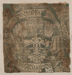 Rondel met hoekige palmetboom, van een tuniek