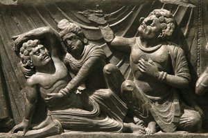 Het Victoria en Albert Museum. Deel van een reliëf van de dood van de Boeddha (parinirvana). 200-400. Kushan periode. Schist. Gandhara/Noordwest Pakistan. Verenigd Koninkrijk door Unbekannt