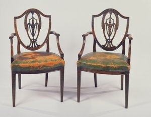 Paar George III rozenhouten eetkamerstoelen, naar een ontwerp van George Hepplewhite door Unbekannt Unbekannt