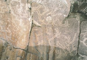 Rotstekeningen in de Hunza-vallei, nabij het archeologische gebied van Karimabad, Pakistan door Benjamin Baud