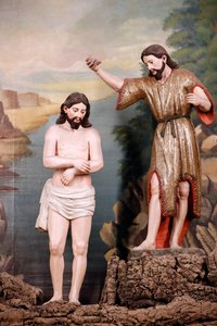 Sint-Franciscuskerk. De doop van Christus door Johannes de Doper in het water van de rivier de Jordaan. Evora. Portugal. door Benjamin Baud