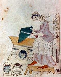 Een jonge vrouw die een mes slijpt. Miniatuur uit een Provençaals manuscript 