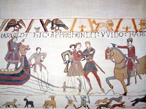 Harold II landde in Normandië waar hij werd gevangengenomen door Willem I de Veroveraar. Tapijt van Bayeux, bekend als Borduurwerk van Koningin Mathilde