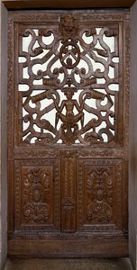 Houten gesneden deur met skelet door Unknown artist