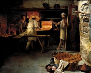 Uitzicht van binnenuit een bakkerij. Bakkers bakken het brood in de oven (18e eeuw)