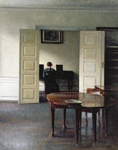 Een interieur met een vrouw die piano speelt, 1910