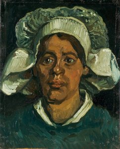 Hoofd van een boerin met een witte kap, 1884-1885 door Vincent van Gogh