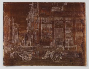 Oud stadsgedeelte van Amsterdam met wagen op de voorgrond