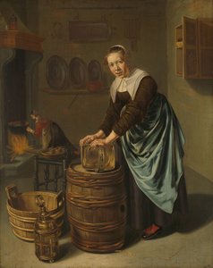 Vrouw die een vat schrobt