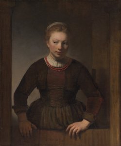 Jonge vrouw bij een open deur door Workshop of Rembrandt van Rijn