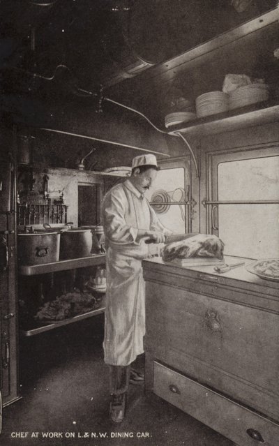 Chef aan het werk in L en NW Dining Car (zwart-wit foto) door (after) English photographer