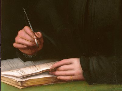 Portret van een jonge man met een boek door Agnolo Bronzino