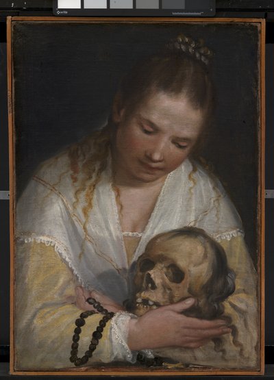 Een jonge vrouw die een schedel overpeinst door Alessandro Casolani