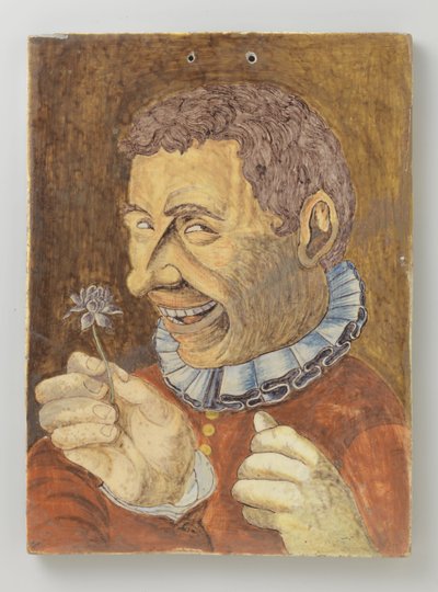 Plaat van faience met man met bloem door Anonymous