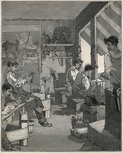 Fabricage van kammen in een werkplaats in Frankrijk in de 19e eeuw. Gravure uit 1885 in 