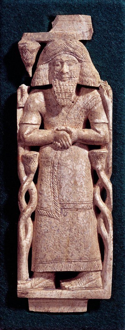 Oosterse antiquiteit: bebaarde figuur met lang haar, gesneden in een ivoren plak. 8e-7e eeuw v.Chr. Arslan Tash uit Syrië. Parijs, Louvre Museum door Assyrian