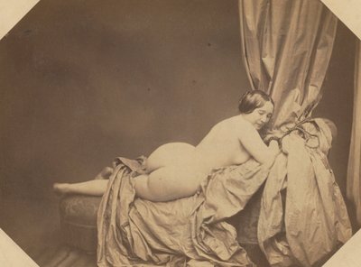 Academisch naakt, liggend op een sofa door Auguste Belloc