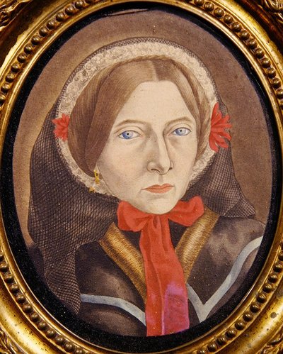 Portret van een vrouw met een hoed en rood lint, ca. 1830 door Austrian School