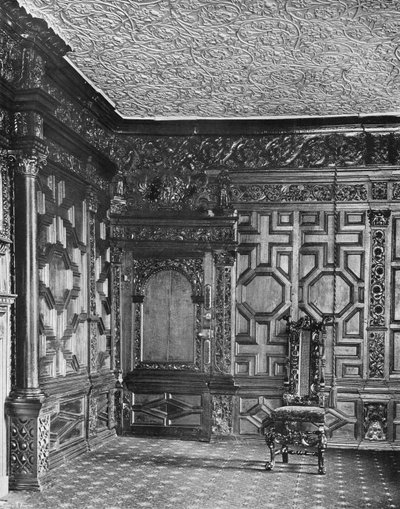 Een hoek in de eiken kamer door Charles Latham