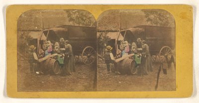 [Familiegroep voor een wagen, vader en kind op geïmproviseerde wip]. door Charles Peeters