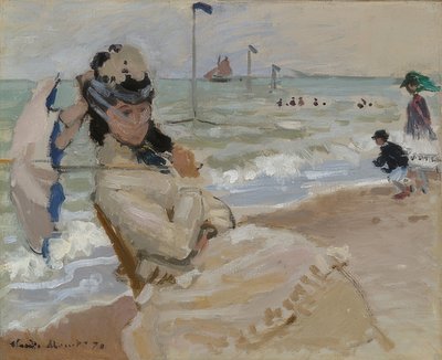 Camille op het strand van Trouville door Claude Monet