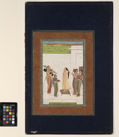Een vrouw voltooit haar toilet, ca. 1725 door Deccani School