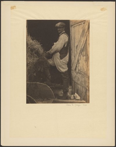 [Man met snor en pet in de deuropening van een schuur]. door Doris Ulmann