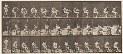 Plaat 418. Toilet, zittend en kousen aantrekken door Eadweard Muybridge