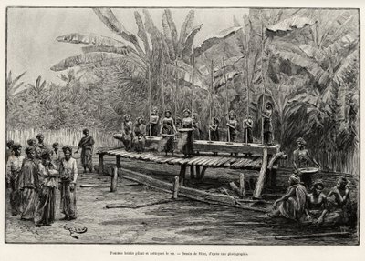 Batak vrouwen, etnische groep van Noord-Sumatra, rijst stampen en schoonmaken. Gravure door Riou. door Edouard Riou