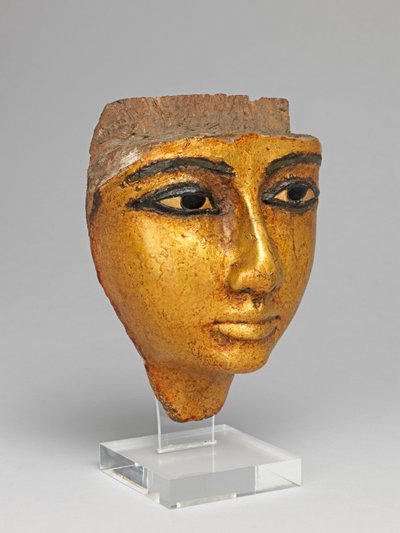 Gezicht van een kist, met ingelegde ogen en wenkbrauwen, verguld door Egyptian 20th Dynasty