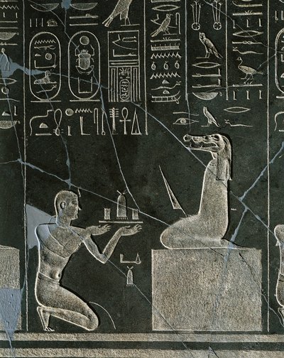 Dolerietreliëf van Nectanebo I, koning die een geschenk aanbiedt aan een krokodillenkop demon, uit Heliopolis bij de tempel van Atum door Egyptian 30th Dynasty