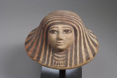 Deksel van een canopische kruik, Nieuwe Koninkrijk (terracotta) door Egyptian School