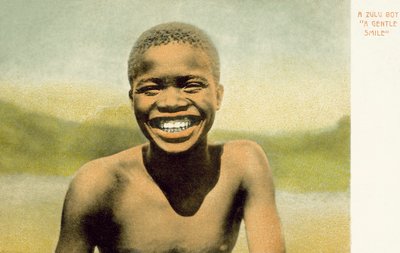 Een Zulu jongen, een zachte glimlach door English Photographer