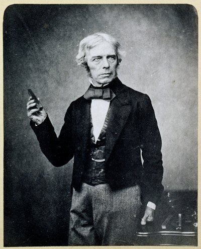 Michael Faraday (1791-1867) met een Staafmagneet, door Maull en Polyblank door English Photographer