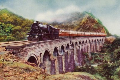 4-6-2 stoomlocomotief van de Bombay, Baroda en Central India Railway die de Frontier Mail trekt over een viaduct tussen Bombay en Delhi door English School