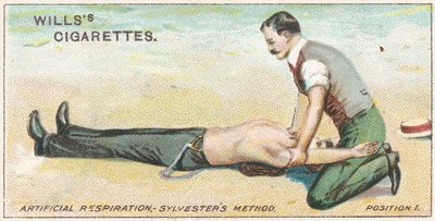 Kunstmatige ademhaling, Sylvesters methode - Positie 1, nr.17 uit de Eerste Hulp-serie van Willss Cigarettes kaarten door English School