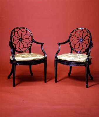 George III gezwart en verguld armstoelen in de stijl van Chippendale, late 18e eeuw door English School