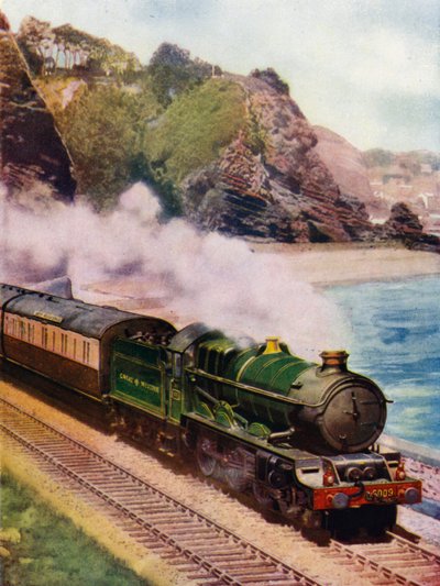King Charles II, Great Western Railway (GWR) King class 4-6-0 stoomlocomotief, die de Cornish Riviera express langs de kust tussen Dawlish en Teignmouth, Devon trekt door English School