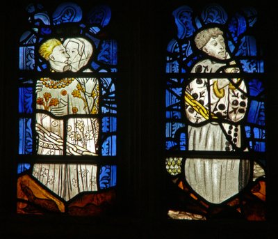 Het oostelijke raam met de Zeven Hoofdzonden: Lust (L) en Luiheid (R) door English School