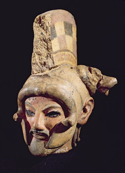 Hoofd van een krijger met een helm, uit Satricum door Etruscan