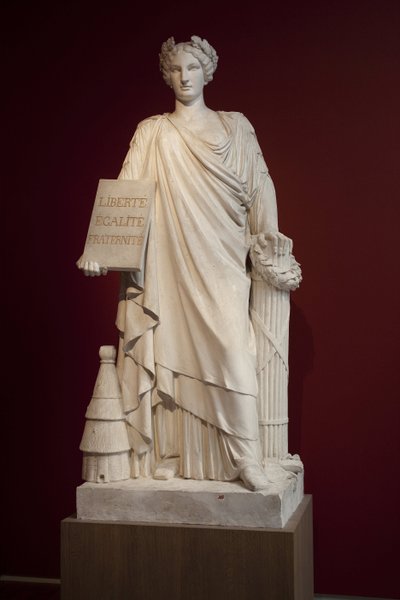 De Franse Republiek. Afgebeeld als een vrouw met een antieke mantel en een plaquette met het motto 
