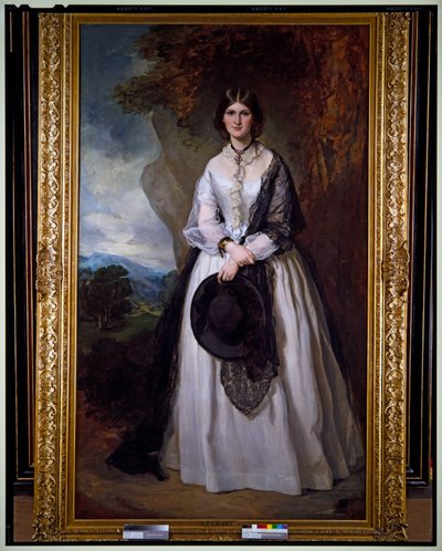 Portret van een dame in een witte jurk, staand in een landschap door Francis Grant