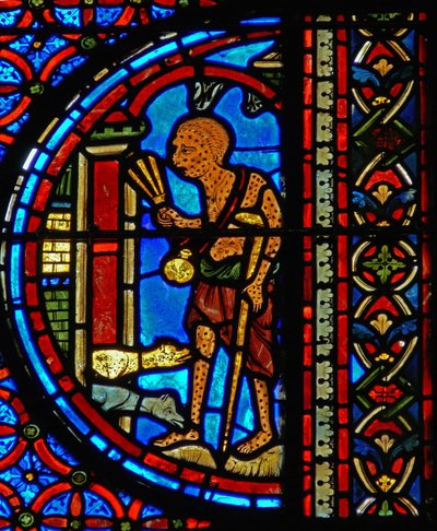 Detail uit een raam van de gelijkenis van Lazarus en de Rijke Man door French School