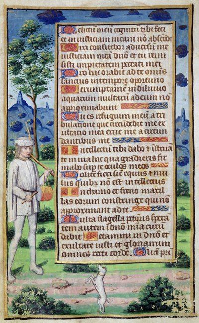 Fol.50v Pagina met tekst en een randdetail van een muzikant die zijn hond laat dansen, uit 