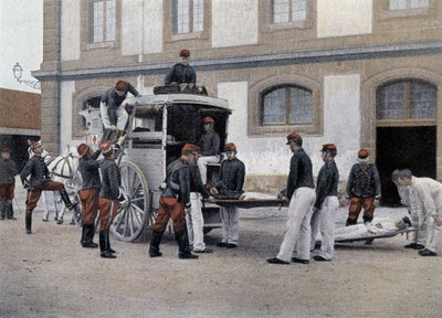Het laden van gewonden in een ambulance - in 