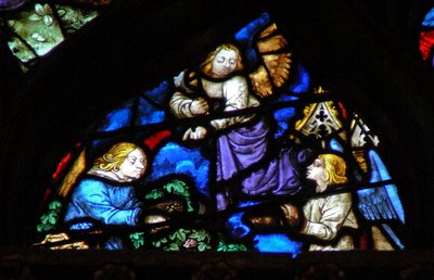 Het westelijke roosvenster met een scène uit het Boek Openbaring: verzamelen van de druiven met de sikkel (14:17-18) door French School
