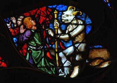 Het westelijke roosvenster met een scène uit het Boek Openbaring: lam op de berg Sion met twee van de 144.000 verlosten (14:1-5) door French School