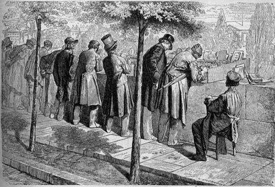 Een "bouquiniste" (boekverkoper) op de kades in Parijs door French School