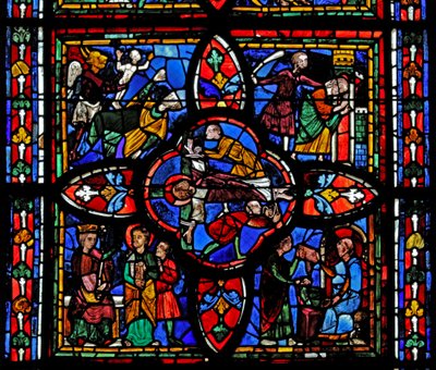 Raam met de tweede sectie van raam w7: in het midden is de kruisiging van St. Petrus; elders is St. Petrus voor Nero; St. Petrus gevangen; de duivel neemt een ziel door French School