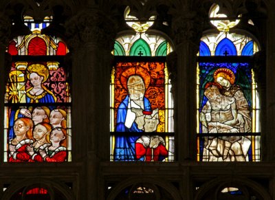 Raam met St. Catherine met de zonen van schenkers door French School
